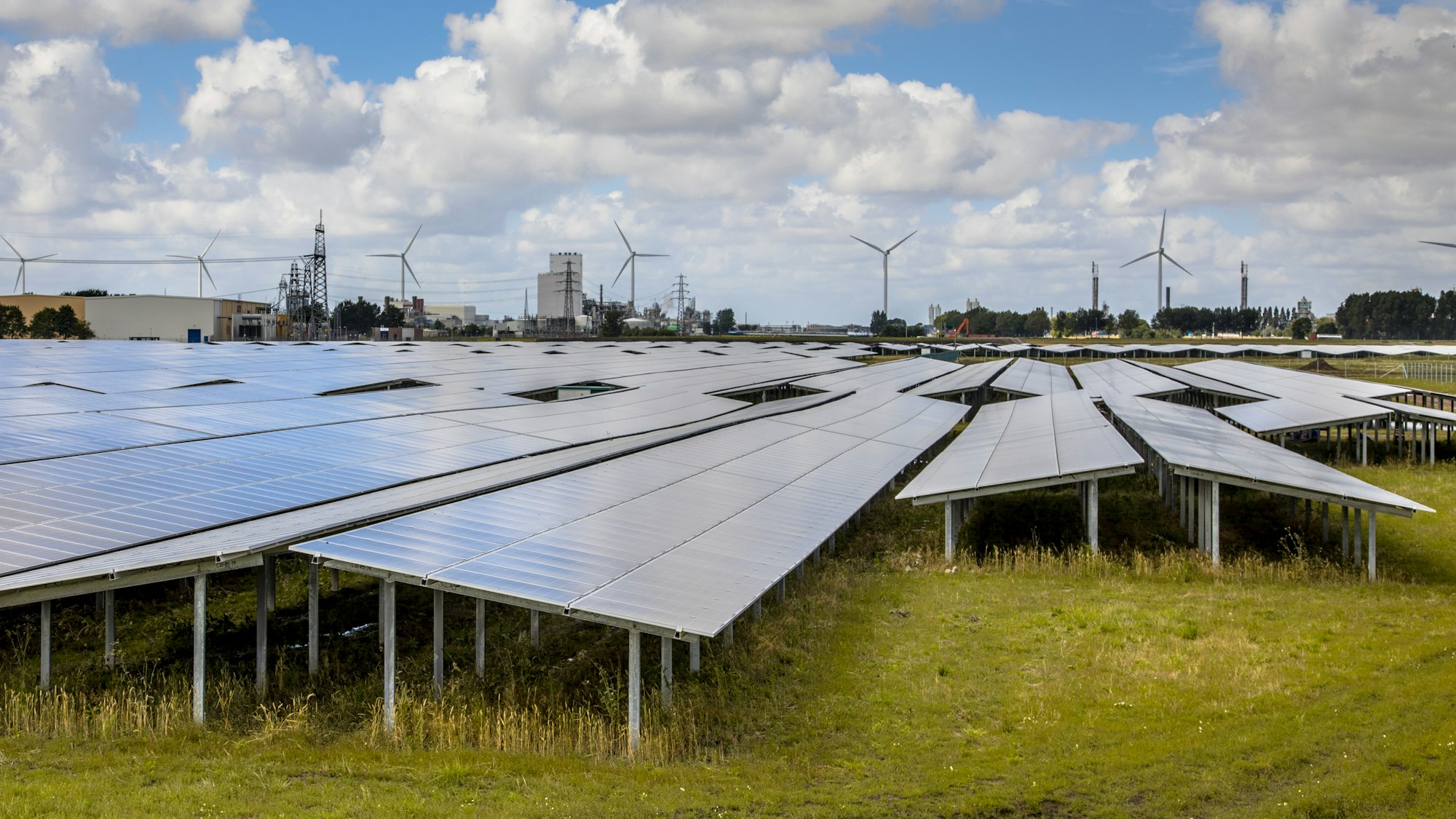 Solar panel field in industrial area